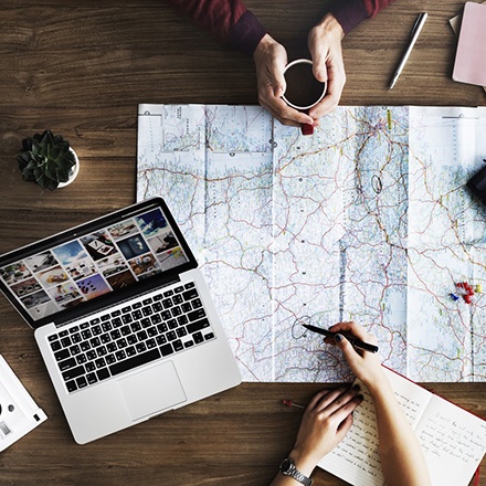 map-and-laptop-440